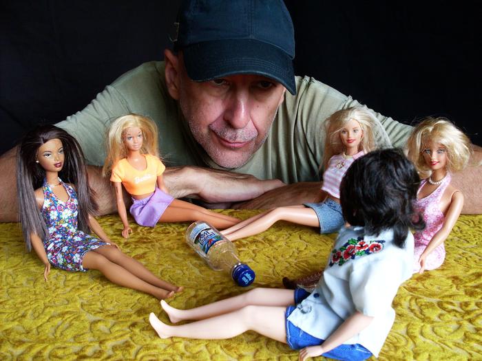 Image result for guy is playing with a doll pictures