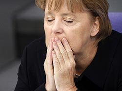 Меркель призывает США к международному сотрудничеству