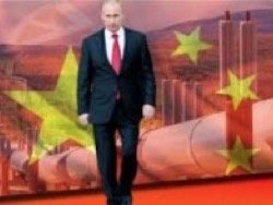 С чем Путин едет в Китай?
